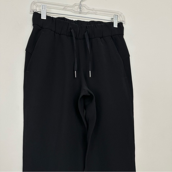 Lululemon On The Fly Pant *Woven 27" Black - Picture 6 of 12